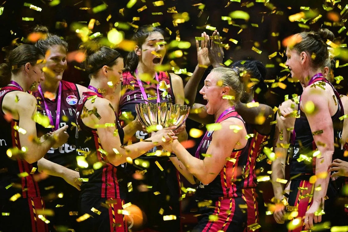 Gold medallist Belgium's players celebrates with the trophy after the FIBA Women's Eurobasket 2023 final basketball match between Spain and Belgium at the Arena Stozice in Ljubljana, Slovenia, on June 25, 2023. 