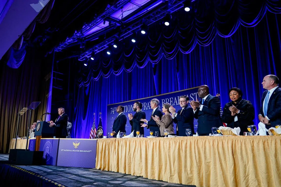 U.S. President Donald Trump receives a standing ovation as he speaks during the National Prayer Breakfast in Washington, D.C., U.S., February 5, 2026. REUTERS/Al Drago
