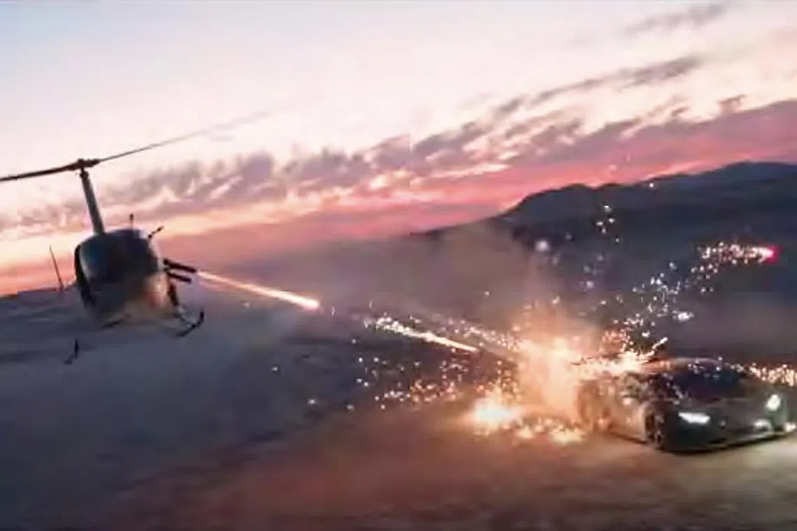 The nearly 11-minute video shows two women shooting fireworks out of the helicopter and toward the sportscar.