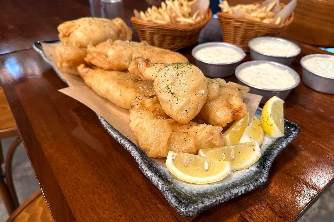 Chef-owner of Black Pearl Restaurant, Jonathan Tan, made fish and chips using a 4kg tuskfish brought by a customer.