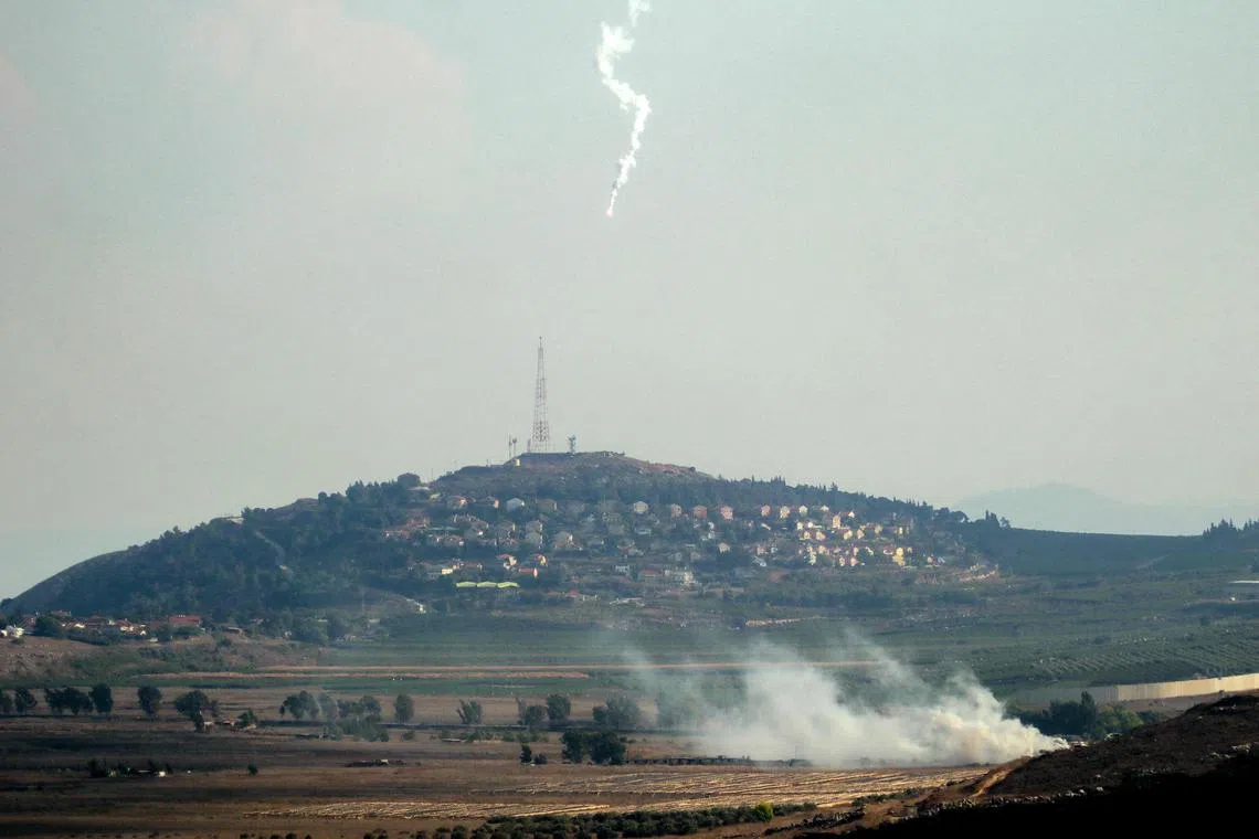 A flare deployed in the southern Lebanese Marjayoun plain after being hit by Israeli shelling on Sept 7.
