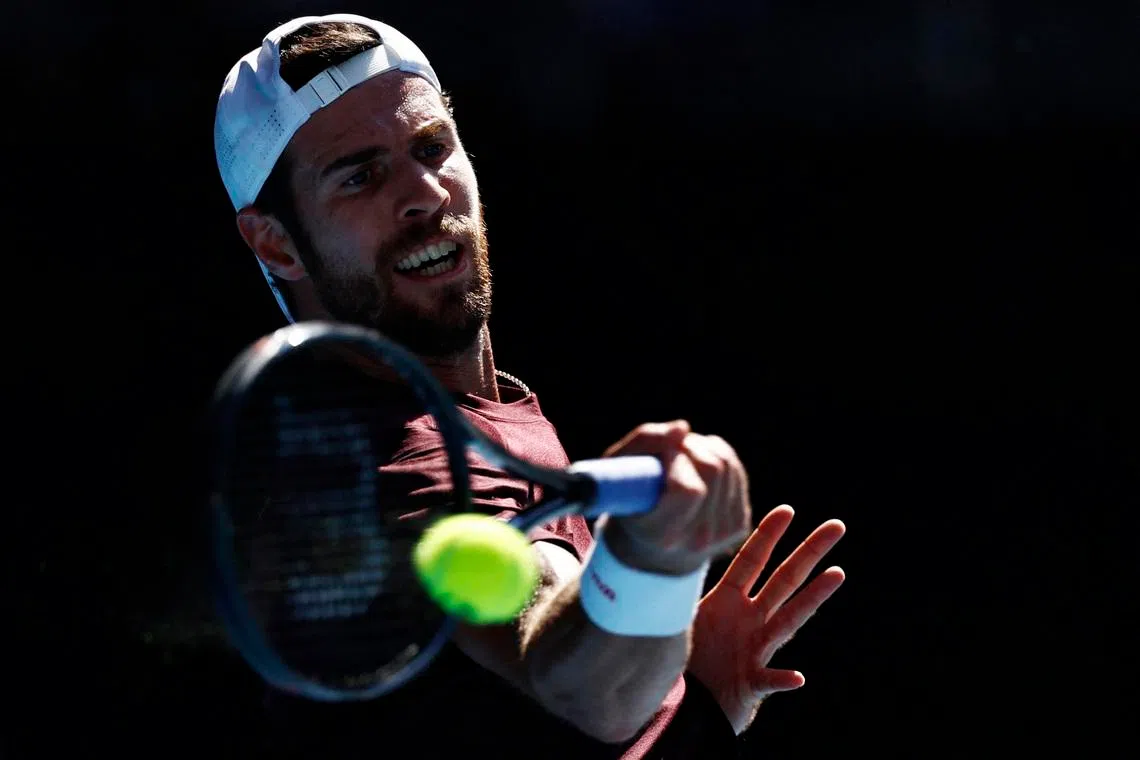 Tennis - Australian Open - Melbourne Park, Melbourne, Australia - January 20, 2026 Russia's Karen Khachanov in action during his first round match against Alex Michelsen of the U.S. REUTERS/Tingshu Wang