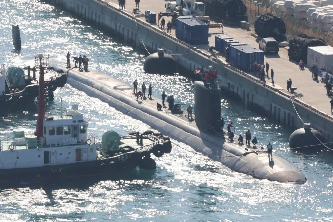 The nuclear-powered submarine USS Alexandria docks at a naval base in Busan, South Korea, 10 February 2025.  
