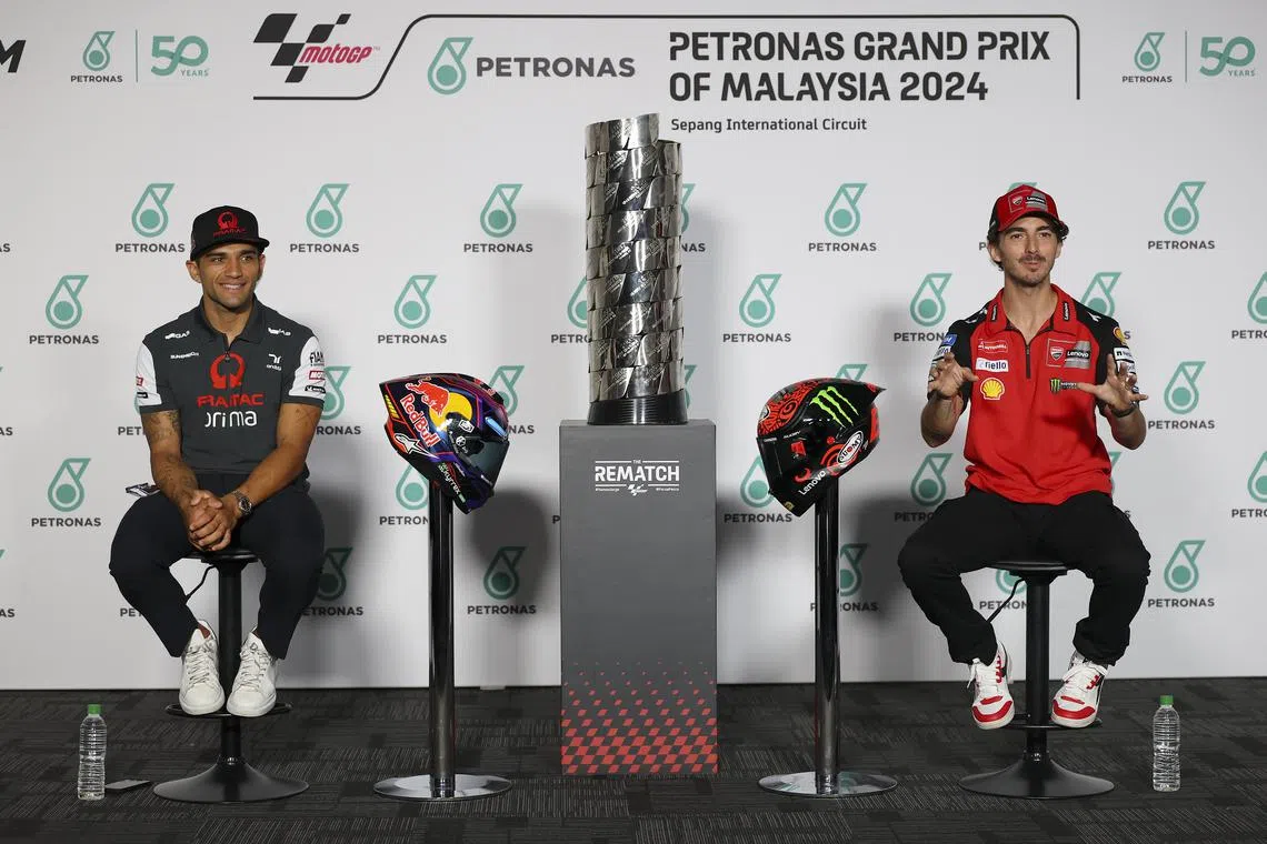 Title rivals Prima Pramac rider Jorge Martin (left) of Spain and Ducati Lenovo rider Francesco Bagnaia of Italy at a press conference on Oct 31, 2024 ahead of the Malaysia Motorcycling Grand Prix in Sepang. Both are in favour of moving the season-ending race from Valencia following the deadly floods.