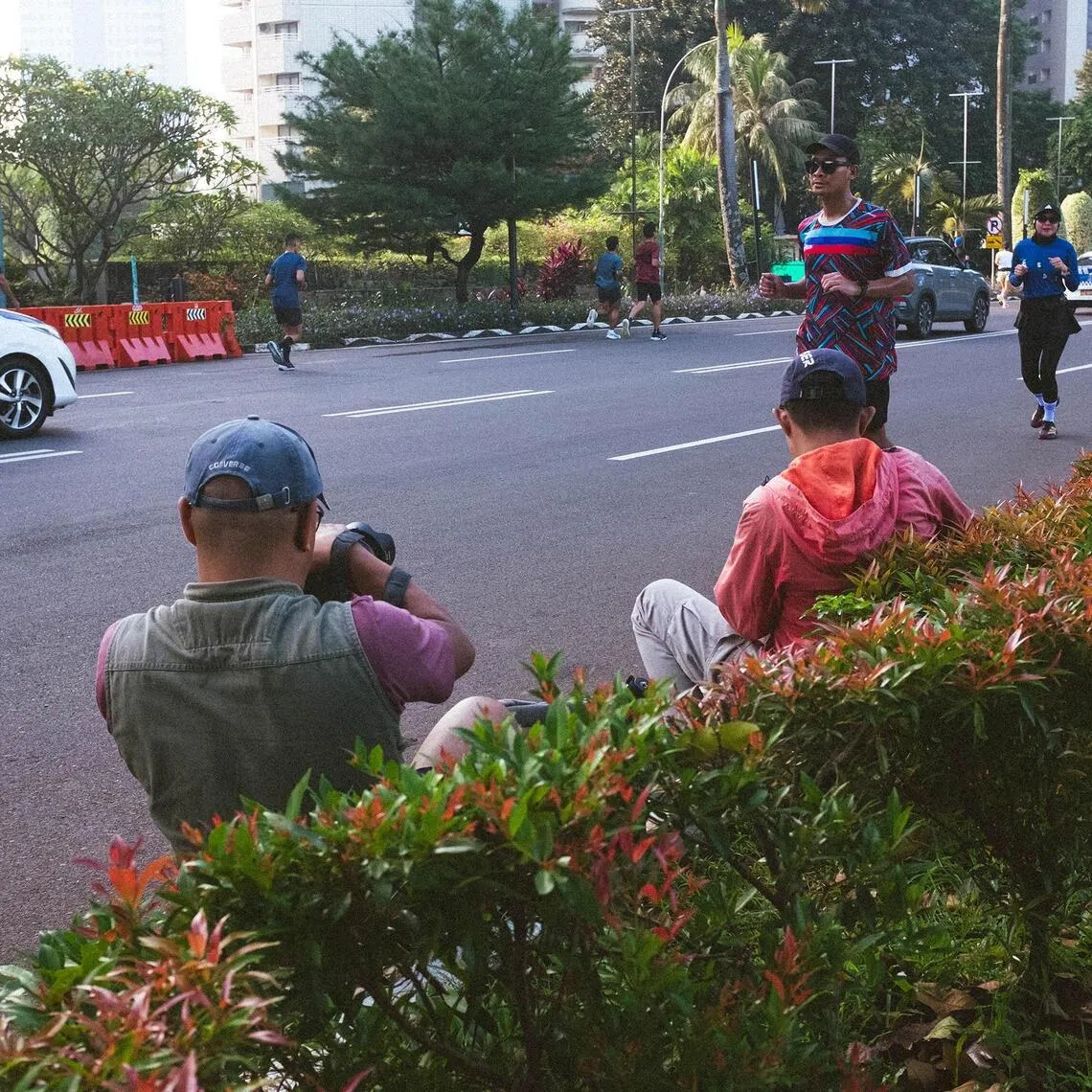 ktrun - Street photographers line the area around the Gelora Bung Karno sports complex in the Senayan area of Central Jakarta. 

All photos by Karina Tehusijarana