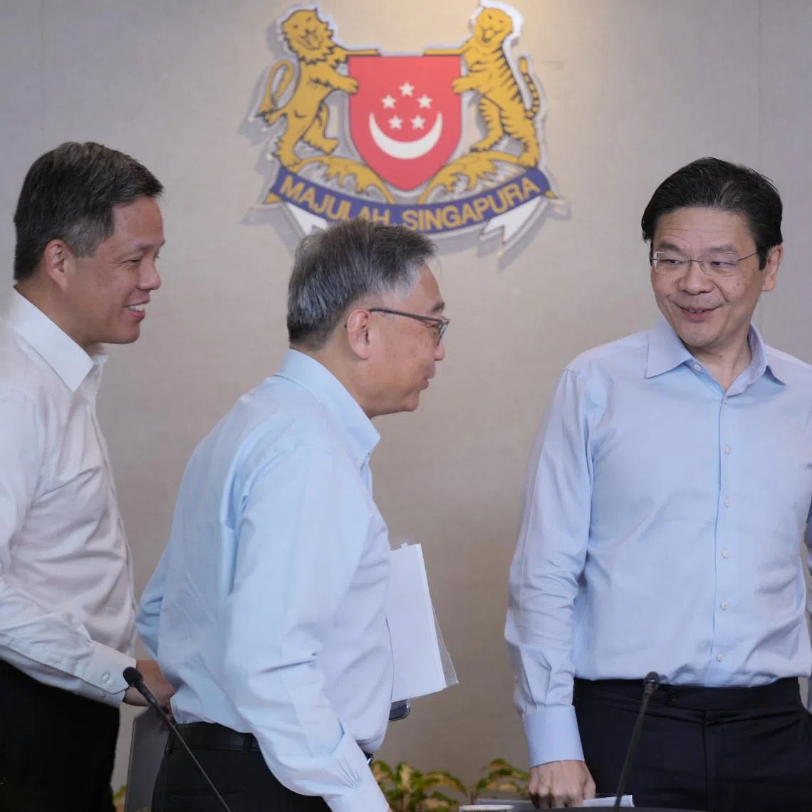 (From right) PM Lawrence Wong, DPM Gan Kim Yong and Mr Chan Chun Sing at a press conference on May 21.