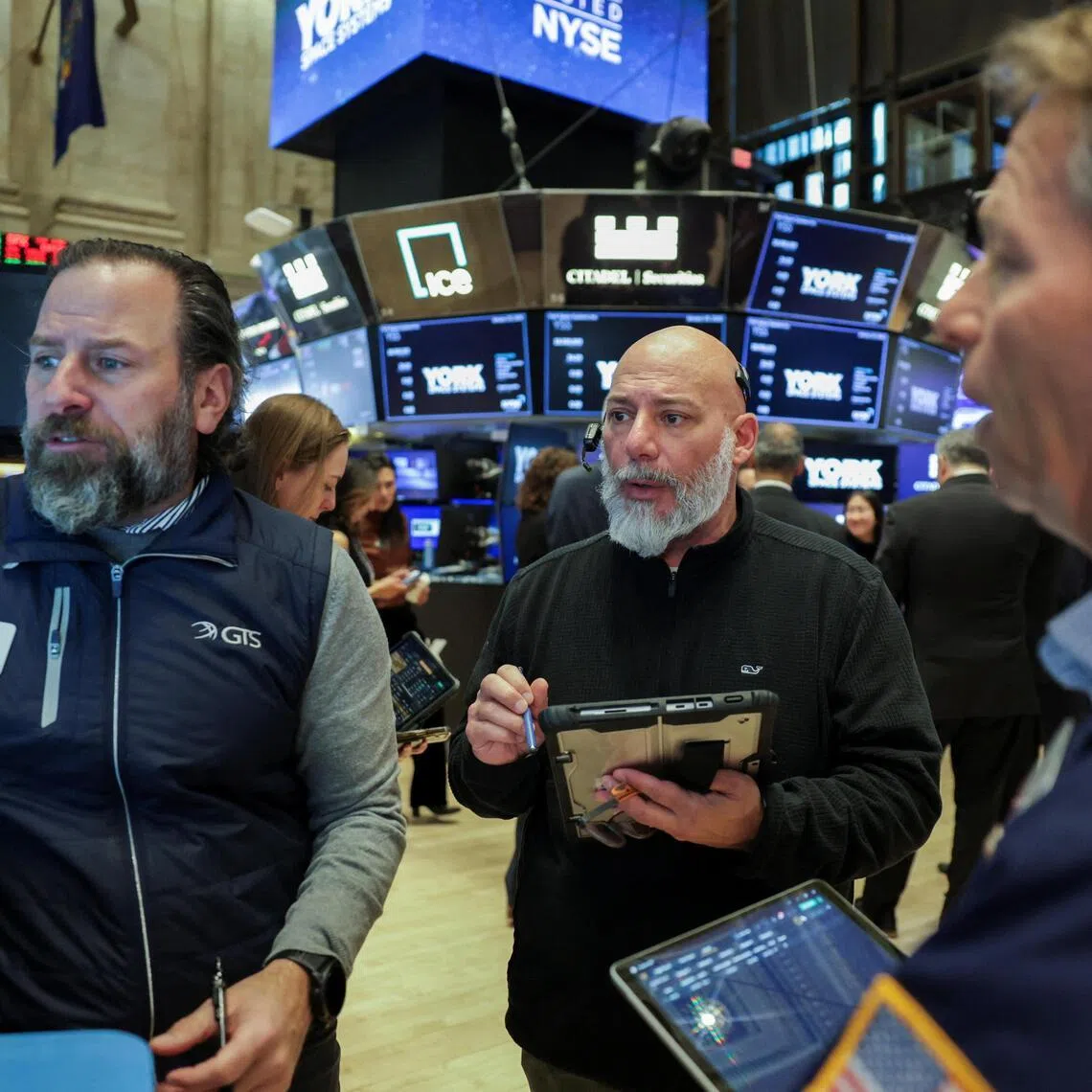 Traders working on the floor of the New York Stock Exchange, in New York City, on Jan 29.