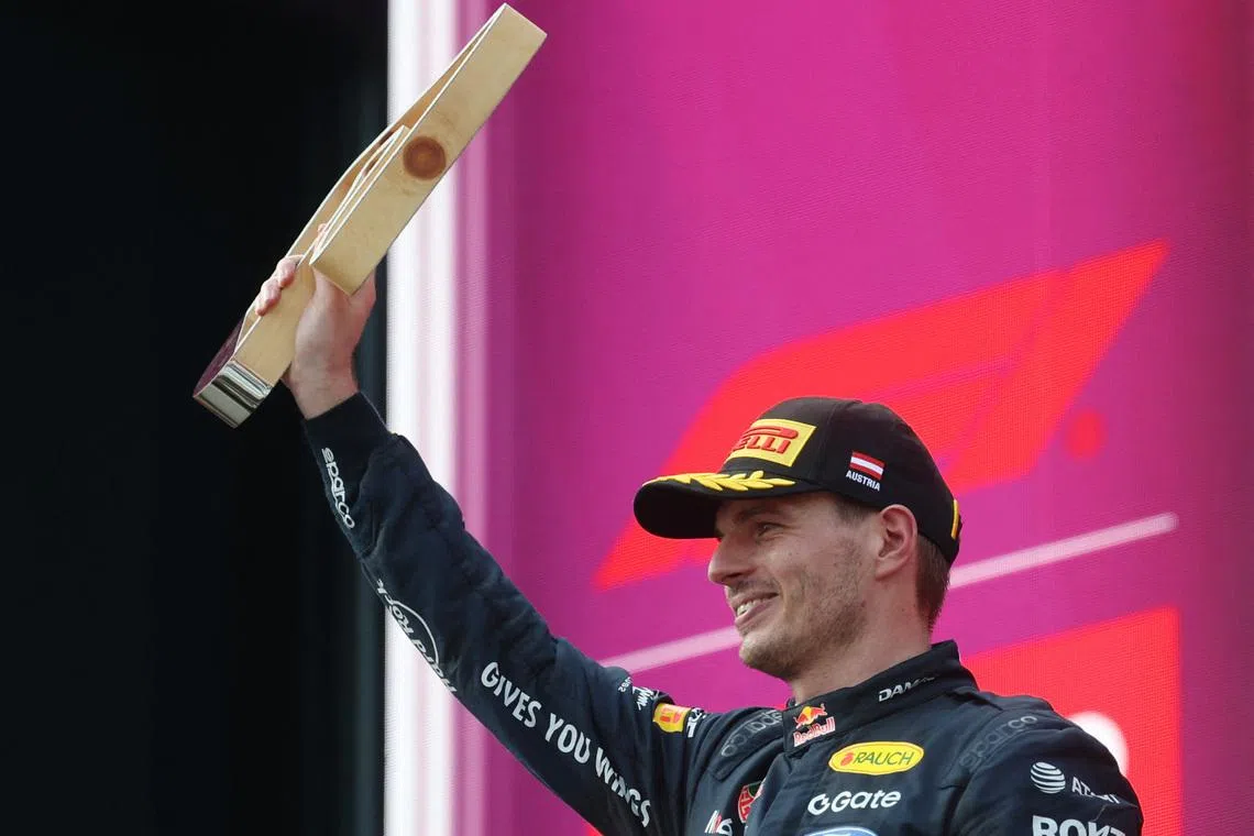 Red Bull’s Max Verstappen celebrating with a trophy on the podium after finishing second in the Austrian Grand Prix at the Red Bull Ring in Spielberg on June 28.