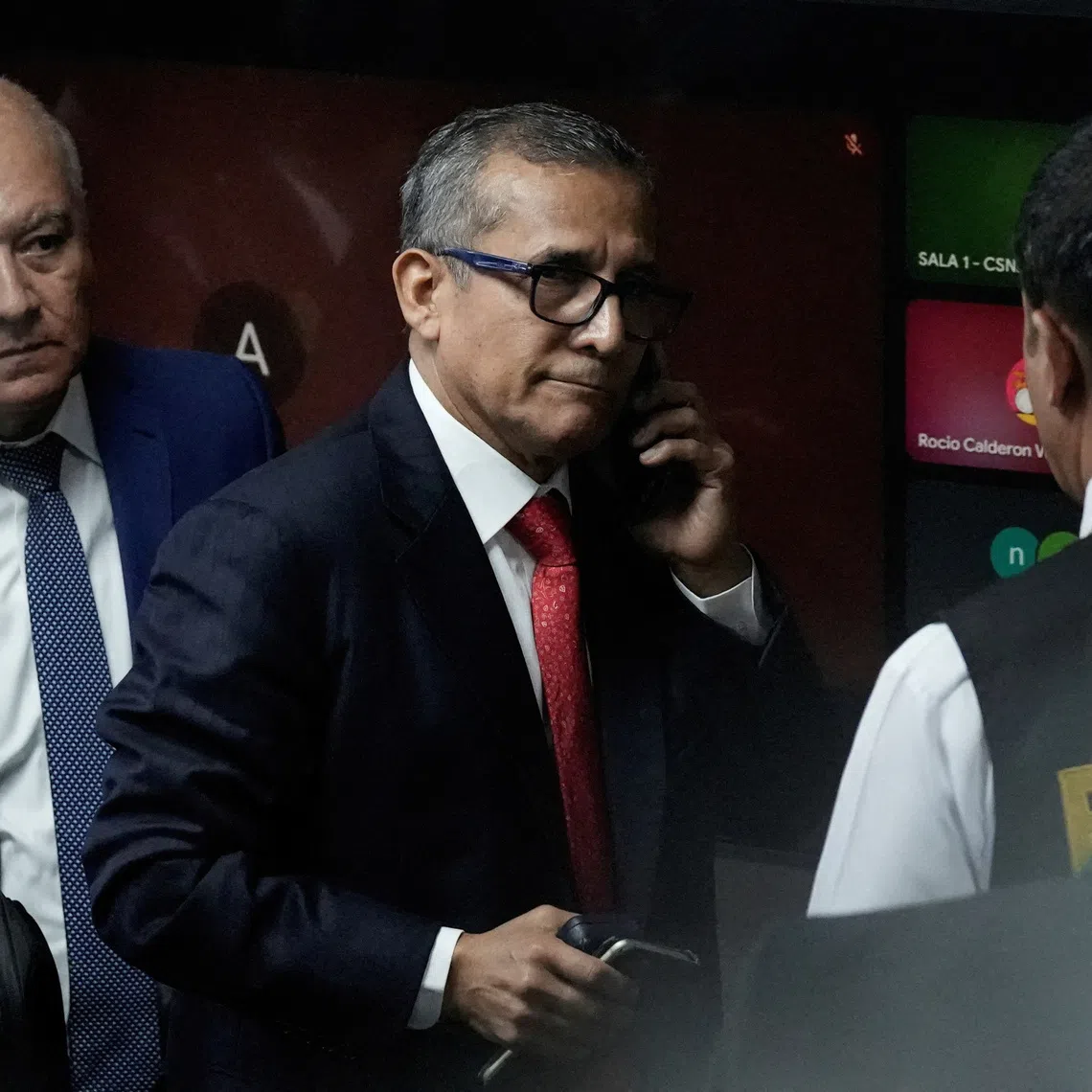 Peru's former President Ollanta Humala, who is accused of money laundering, is escorted by the police after hearing the sentence of 15 years at the court in Lima, Peru April 15, 2025. REUTERS/Angela Ponce