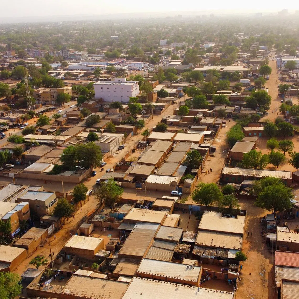 A drone picture shows a suburb following the attack on the international airport in Niamey, Niger January 30, 2026. REUTERS/ Mahamadou Hamidou