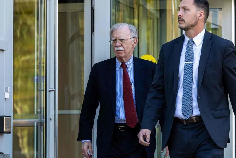 Former US National Security Advisor John Bolton leaves the Maryland courthouse after pleading not guilty to charges of mishandling classified material.