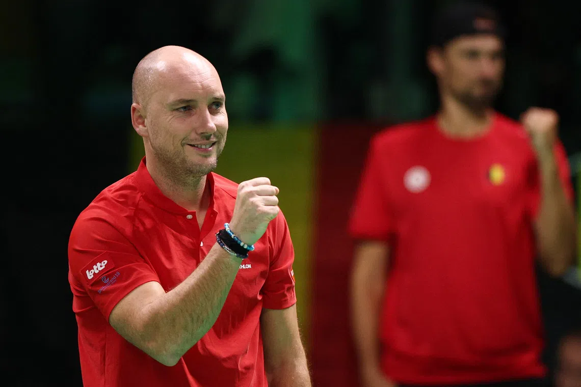 Tennis - Davis Cup - Final 8 - France v Belgium - Unipol Arena, Bologna, Italy - November 18, 2025 Belgium captain Steve Darcis reacts after Belgium's Zizou Bergs wins the first set of his singles match against France's Arthur Rinderknech REUTERS/Guglielmo Mangiapane