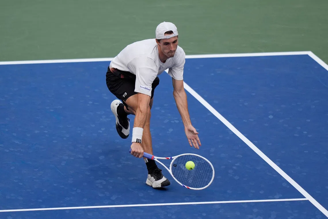 Tennis - U.S. Open - Flushing Meadows, New York, United States - September 4, 2025 Britain's Joe Salisbury in action with Britain's Neal Skupski during the men's doubles semi final match against New Zealand's Michael Venus and India's Yuki Bhambri REUTERS/Eduardo Munoz