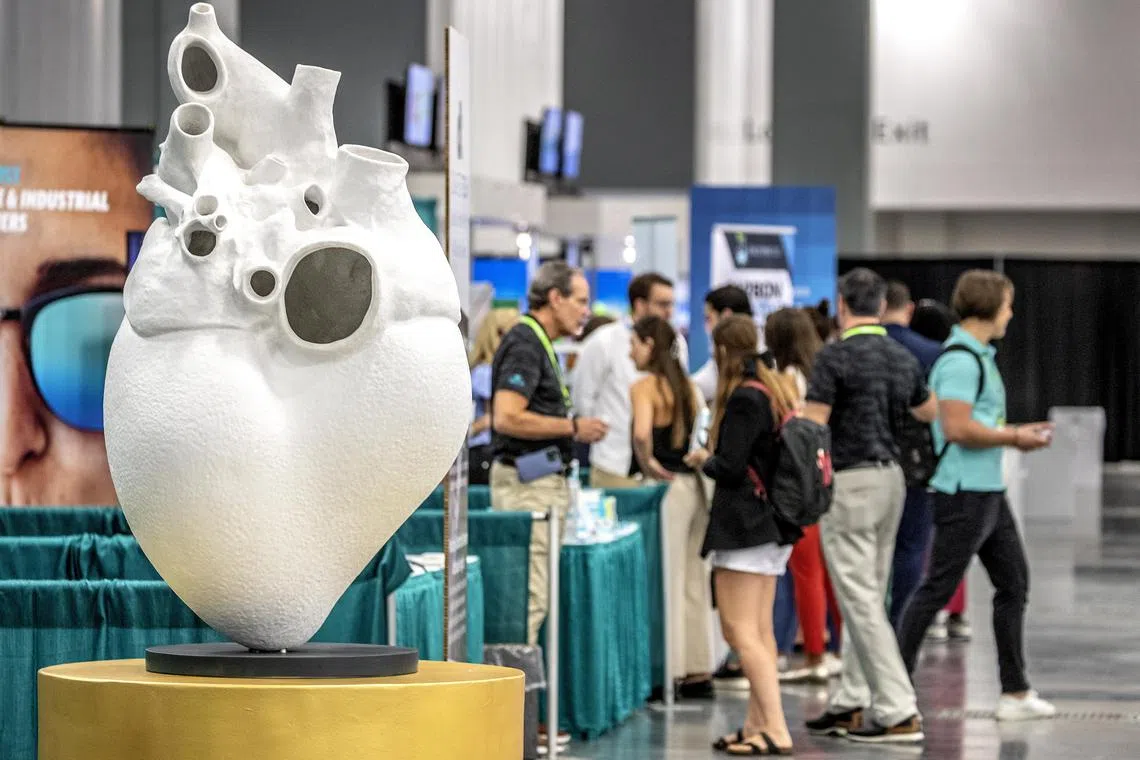 People walk near to an actual size whale’s heart sculpture, part of the 'Underwater Public Sculpture Park and Artificial Reef' project, exhibited during the 'Aspen Ideas: Climate Conference' celebrated in the Miami Beach Convention Center in Miami Beach, Florida, USA, 07 March 2023. According to the organisers, the conference, held for the second time in Miami Beach is to convene a diverse group of global and local policymakers, scientific experts, corporate leaders, innovators, young leaders, influencers, artists and members of the public to engage with climate solutions that have the potential to reshape our world.  