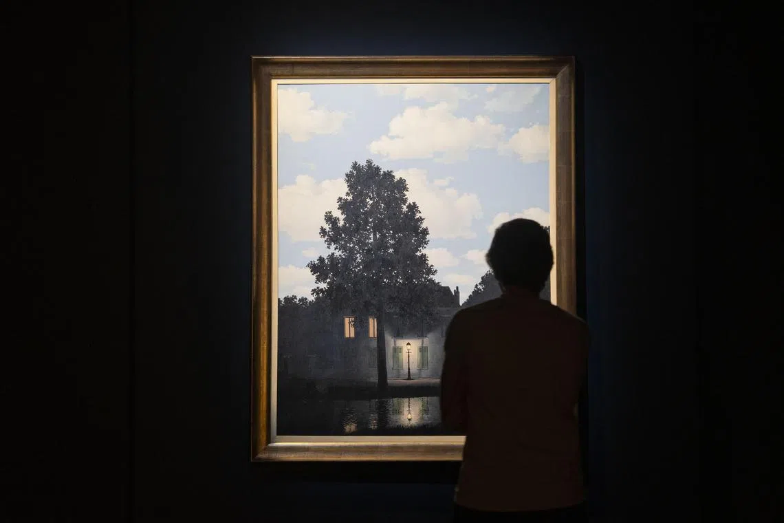 The painting “Empire of Light" by René Magritte, in an auction preview show at Christie’s in Midtown, Manhattan, Nov. 13, 2024. Will the art market go bananas again, like it did before the pandemic, now that Donald Trump has been elected to the White House on promises to cut taxes? (Hiroko Masuike/The New York Times)