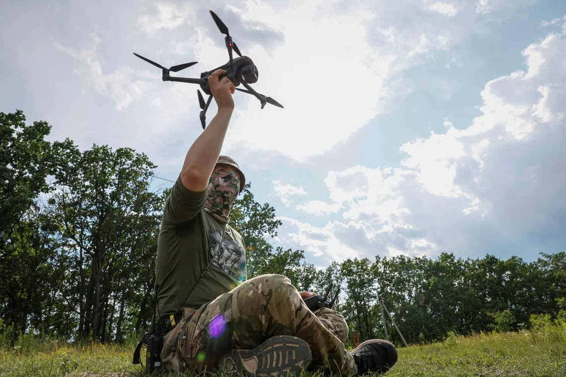 A student of the school for drone pilots practices during a lesson, amid Russia's attack on Ukraine, in an undisclosed location, Ukraine, June 30, 2023. REUTERS/Alina Smutko