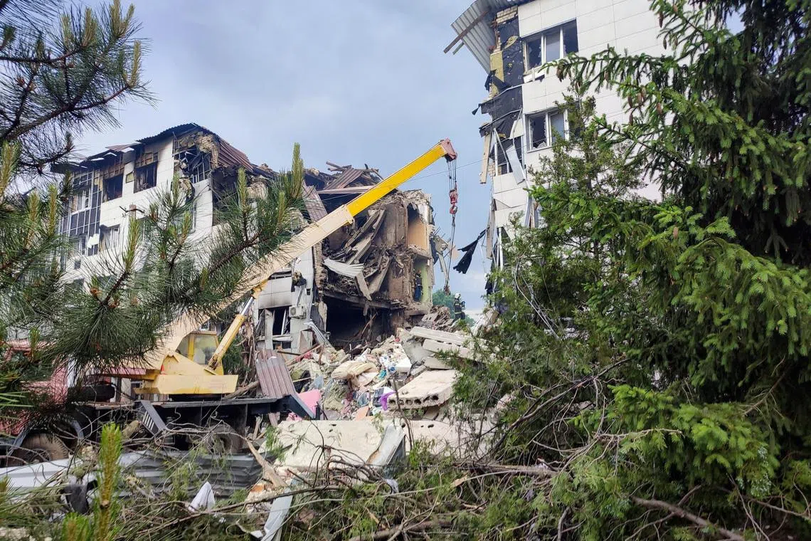 FILE PHOTO: Rescuers work amid debris of a destroyed dormitory building of the Starobilsk College of Luhansk Pedagogical University following an overnight attack, what Russian-installed authorities called a Ukrainian drone strike, in the course of the Russia-Ukraine conflict in the town of Starobilsk (Starobelsk) in the Luhansk region, a Russian-controlled area of Ukraine, May 22, 2026. Picture taken with a mobile phone. REUTERS/Pavel Klimov/File Photo