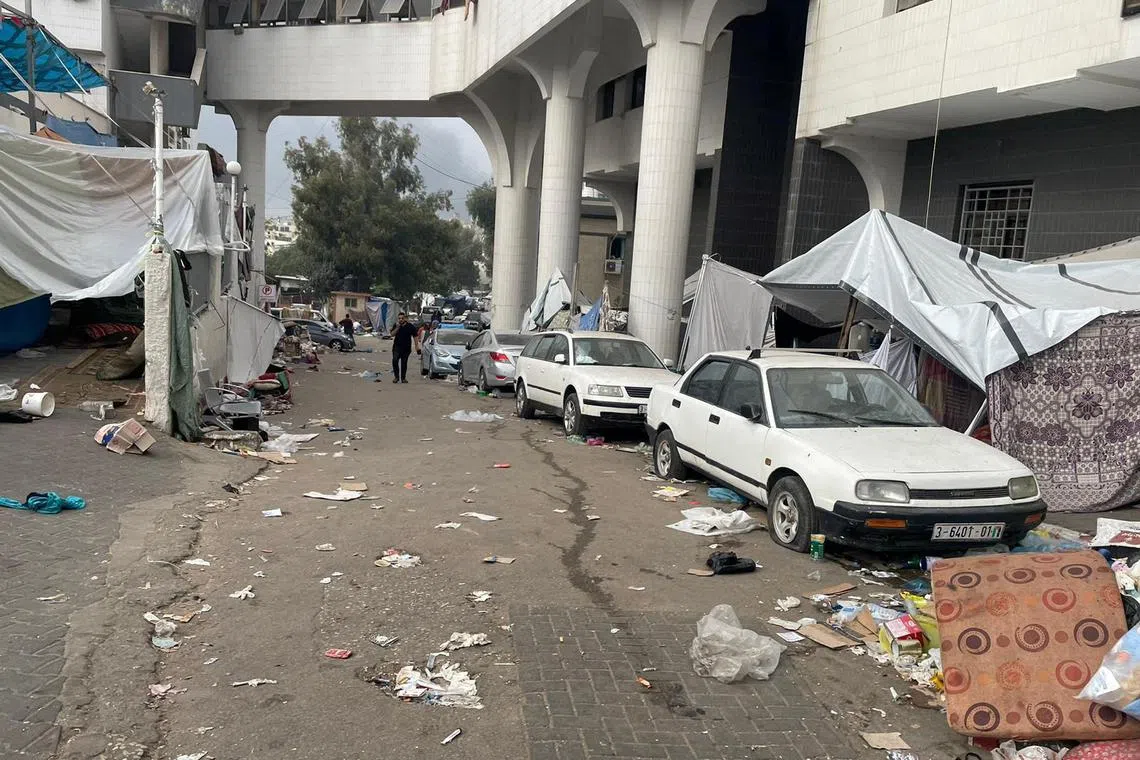 A man walking within the premises of Al Shifa Hospital in Gaza City on Nov 12, 2023.