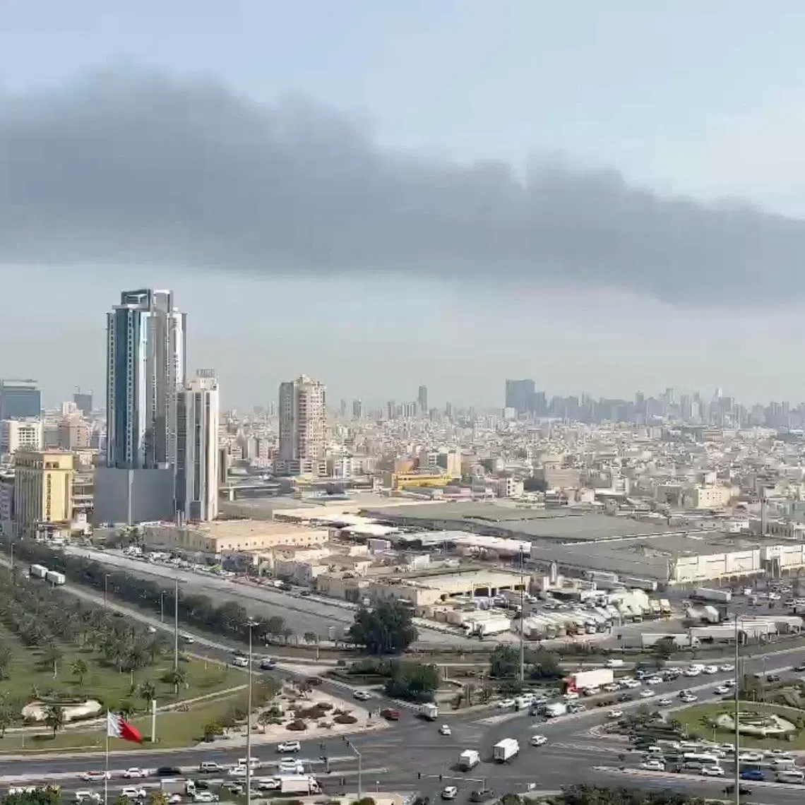 Smoke rises after the state news agency reported missile attack on the service center of the U.S. Fifth Fleet, following strikes by the United States and Israel against Iran, in Manama, Bahrain February 28, 2026 in this still image obtained from a video. Video obtained by Reuters/via REUTERS