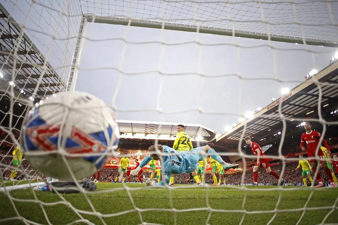 Soccer Football -  FA Cup - Fourth Round - Liverpool v Norwich City - Anfield, Liverpool, Britain - January 28, 2024 Liverpool's Virgil van Dijk scores their fourth goal past Norwich City's George Long REUTERS/Phil Noble