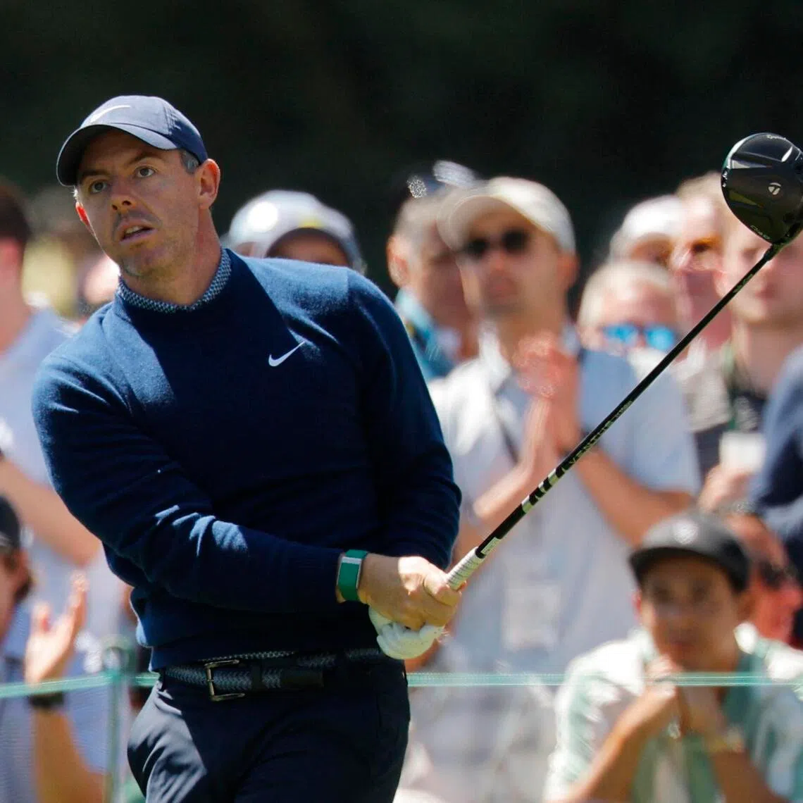 Northern Ireland's Rory McIlroy watches his tee shot on the 17th hole, during the first round of the Masters.