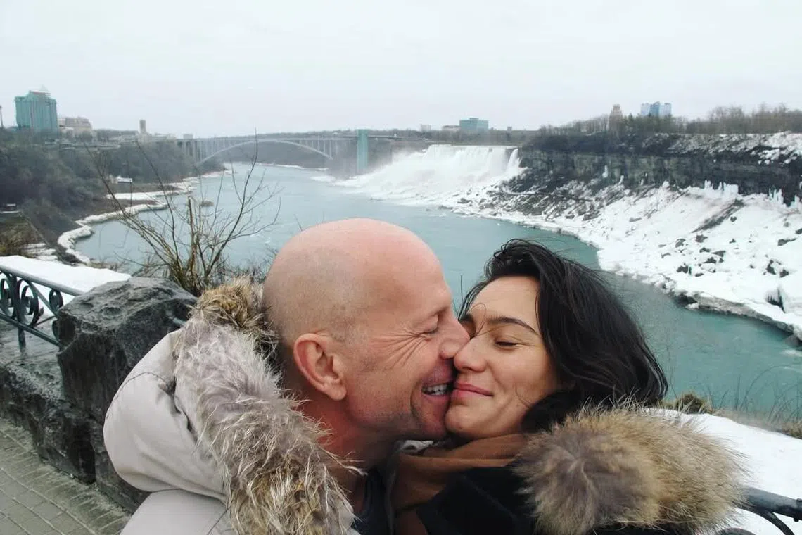 Hollywood star Bruce Willis (left), seen here with his wife Emma Heming Willis, has a rare form of dementia.