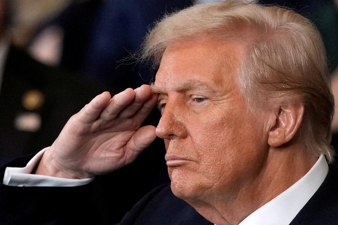 President Donald Trump listens to Christopher Macchio sing during the 60th Presidential Inauguration in the Rotunda of the U.S. Capitol in Washington, Monday, Jan. 20, 2025.     Julia Demaree Nikhinson/Pool via REUTERS