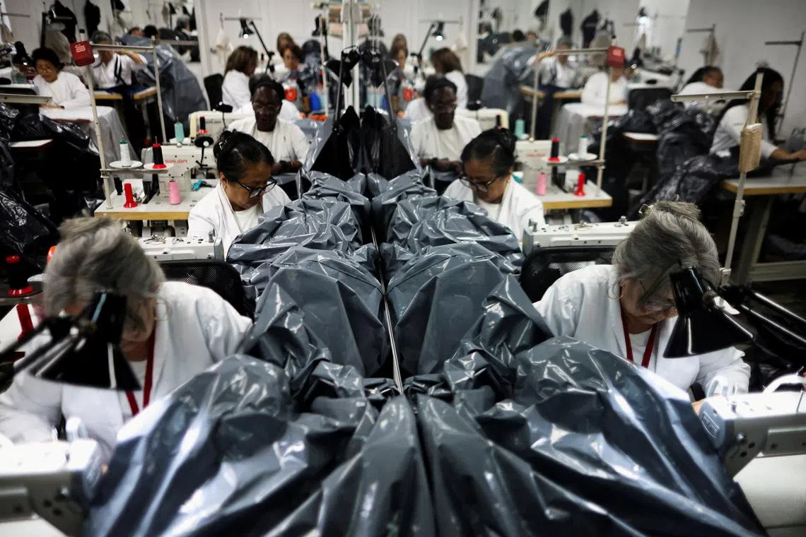 Venezuelan fashion designer swaps dresses for body bags