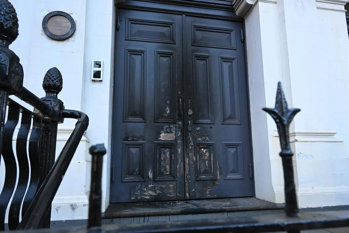 Char marks on the door of the East Melbourne Hebrew Congregation in Melbourne, on July 5. 