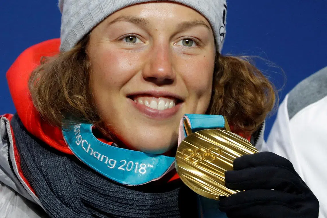 FILE PHOTO: Medals Ceremony - Biathlon - Pyeongchang 2018 Winter Olympics - Women's 10 km Pursuit - Medals Plaza - Pyeongchang, South Korea - February 13, 2018 - Gold medallist Laura Dahlmeier of Germany on the podium. REUTERS/Eric Gaillard/File Photo
