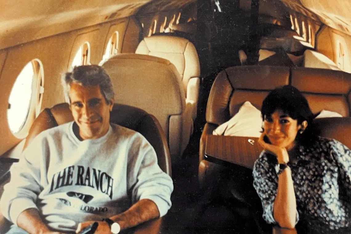 Jeffrey Epstein and Ghislaine Maxwell are seen in this image released by the Department of Justice in Washington, D.C., U.S., on December 19, 2025 as part of a new trove of documents from its investigations into the late financier and convicted sex offender Jeffrey Epstein. U.S. Justice Department/Handout via REUTERS