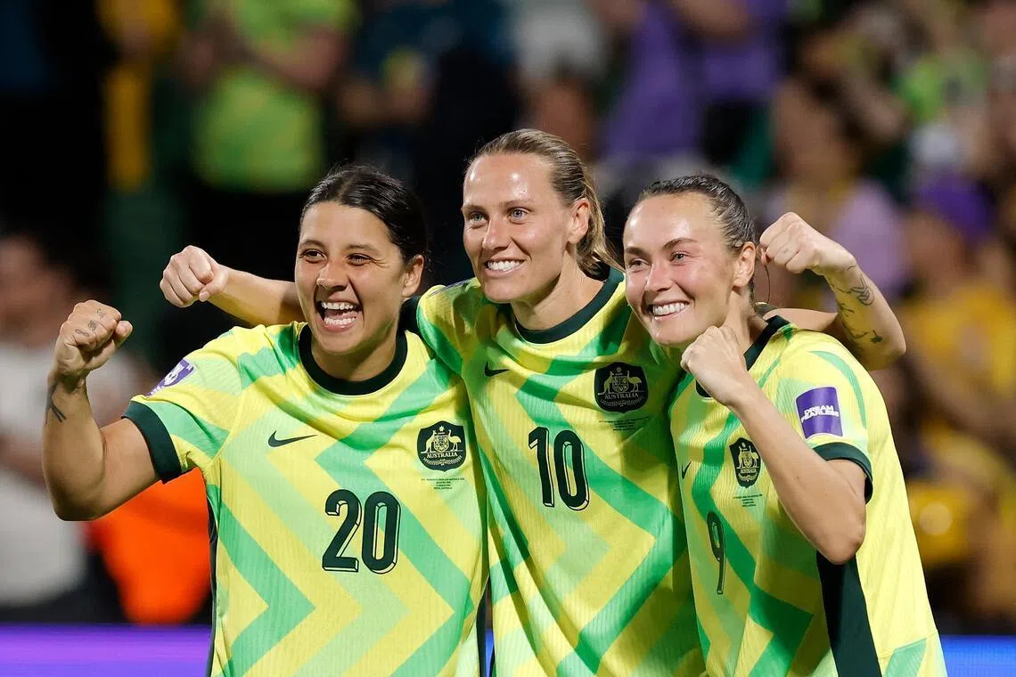 From left: Sam Kerr, Emily van Egmond and Caitlin Foord of Australia celebrating after the 2-1 Women’s Asian Cup quarter-final win over North Korea at Perth Rectangular Stadium on March 13, 2026.