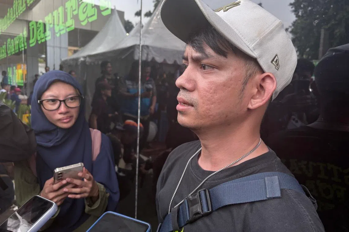 Mr Muhammad Iqbal, 32, whose cousin Ms Endang Kuswati was stuck in the crushed train carriage for around 10 hours before being rescued.