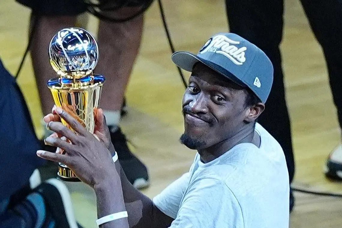 Indiana Pacers forward Pascal Siakam lifting the Larry Bird Trophy after recording 31 points and three blocked shots in Game 6 of the NBA Eastern Conference finals. It was his third 30-point outing of the series, which the Pacers won 4-2 after a 125-108 triumph at Gainbridge Fieldhous in Indianapolis on May 31.