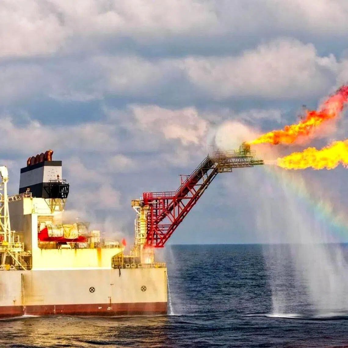 A rainbow appears during a flaring operation at the Malampaya gas field off the coast of Palawan province, Philippines.