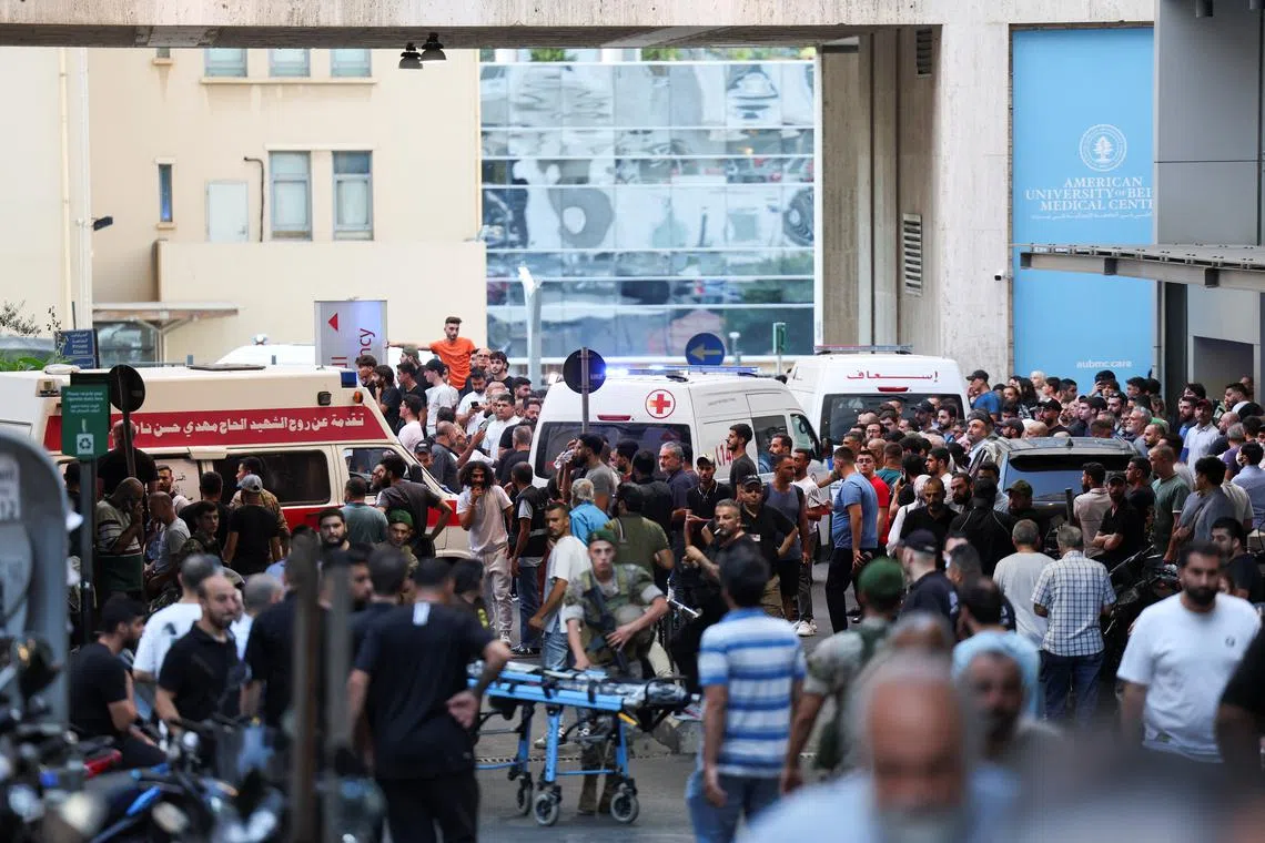 Ambulances arrive to American University of Beirut Medical Center (AUBMC) as more than 1,000 people, including Hezbollah fighters and medics, were wounded when the pagers they use to communicate exploded across Lebanon, according to a security source, in Beirut, Lebanon September 17, 2024. REUTERS/Mohamed Azakir/File Photo