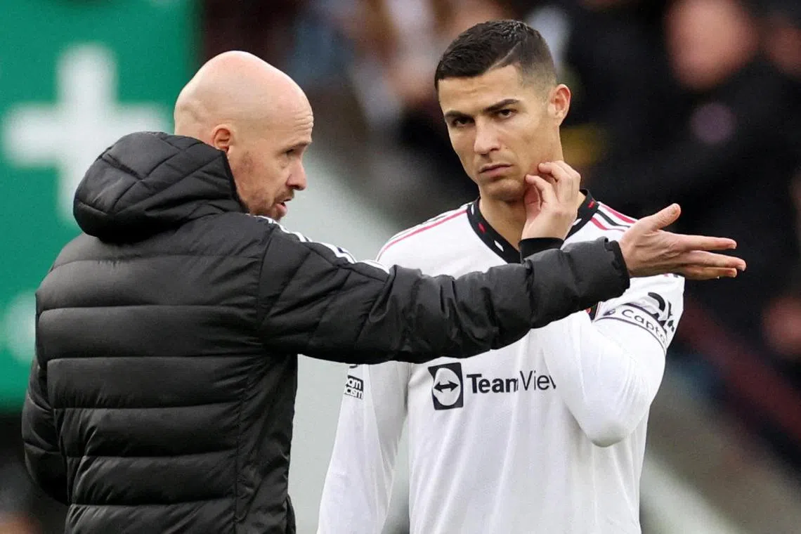 Manchester United manager Erik ten Hag speaks to Cristiano Ronaldo during the Premier League game against Aston Villa on Nov 6. 