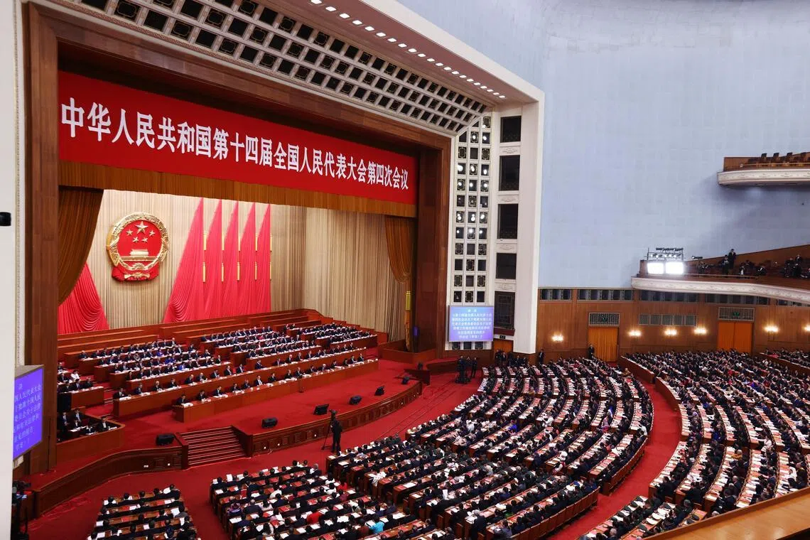 A general view of the closing meeting of the Fourth Session of the 14th National People's Congress (NPC) at the Great Hall of the People in Beijing, China, 12 March 2026. China holds two major annual political meetings, the National People's Congress (NPC) and the Chinese People's Political Consultative Conference (CPPCC) which run alongside and together are known as 'Lianghui' or 'Two Sessions'.  EPA/WU HAO