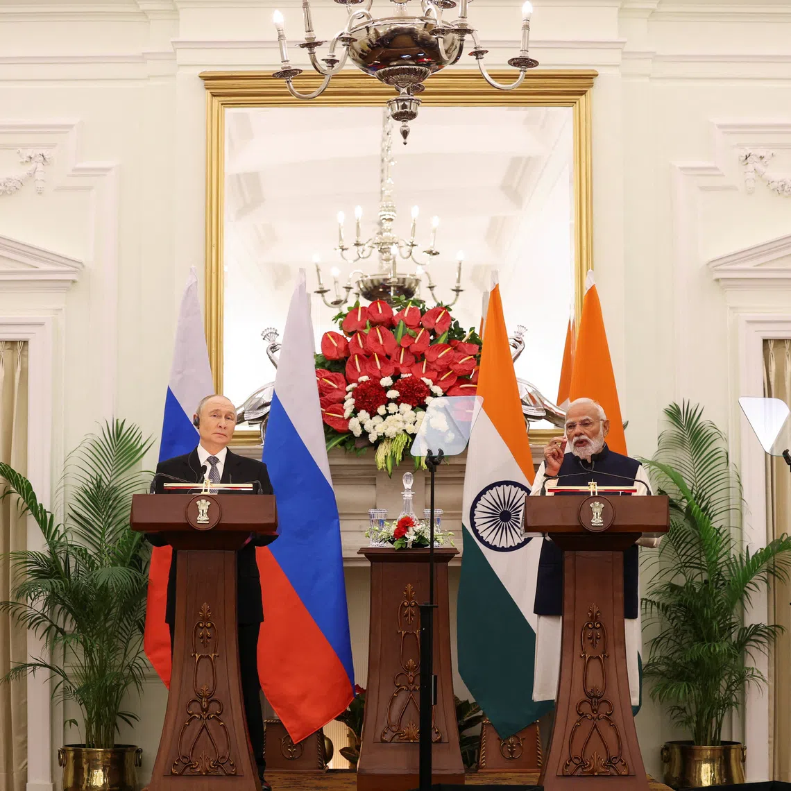 Russian President Vladimir Putin and India's Prime Minister Narendra Modi attend a presentation of a joint statement after their delegation level talks at Hyderabad House in New Delhi, India, December 5, 2025. REUTERS/Adnan Abidi