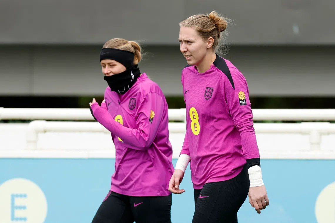 Soccer Football - Women's International Friendly - England Training - St. George's Park, Burton upon Trent, Britain - October 24, 2025 England's Hannah Hampton and Anna Moorhouse during training Action Images via Reuters/Jason Cairnduff