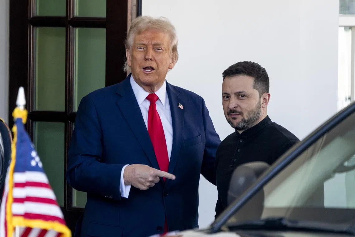 US President Donald Trump greets Ukraine President Volodymyr Zelensky at the White House in Washington, on Feb 28.