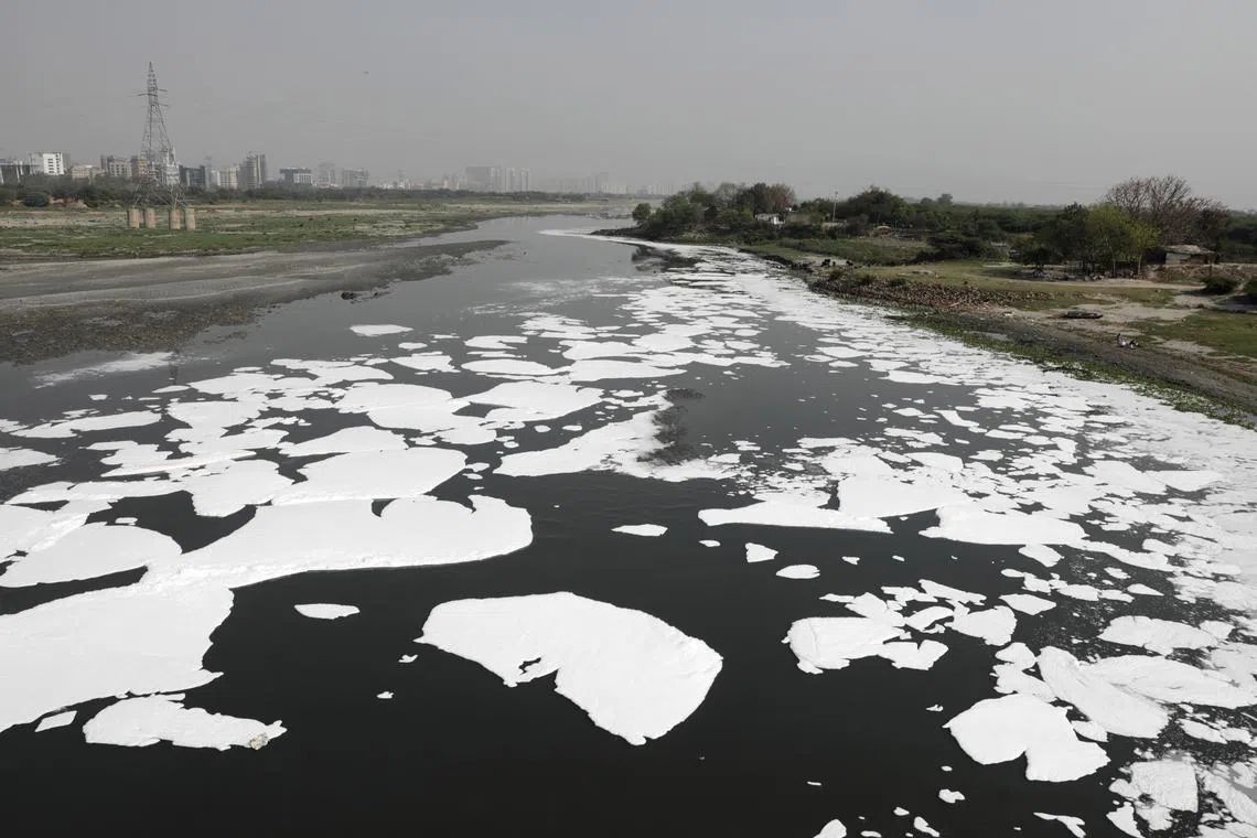A stretch of the Yamuna river covered with toxic foam in New Delhi, India, March 19, 2024. The Yamuna river’s stretch in the Indian capital area has become the most polluted part of the river over the years. 