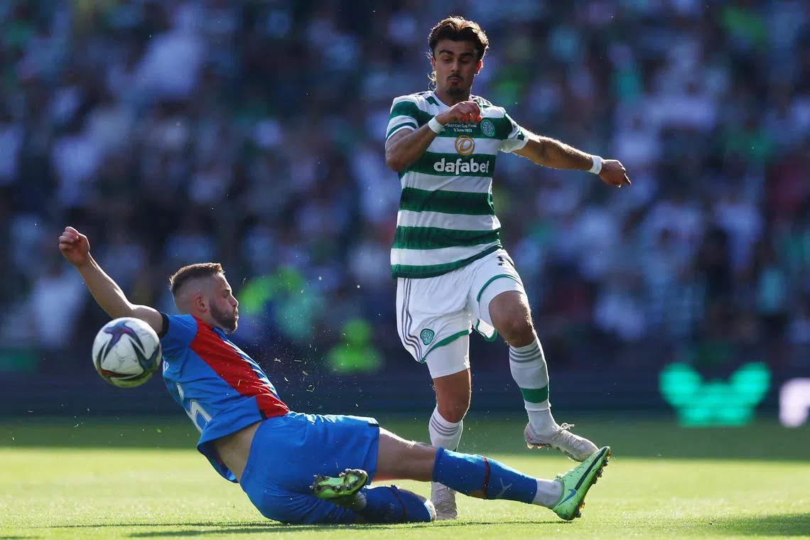 Celtic's Jota in action against Inverness Caledonian Thistle's Daniel Devine during the Scottish Cup final in Hampden Park, Glasgow.