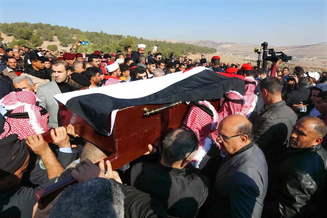A funeral was held on Dec 16 for the senior police officer who was killed in riots on Thursday.