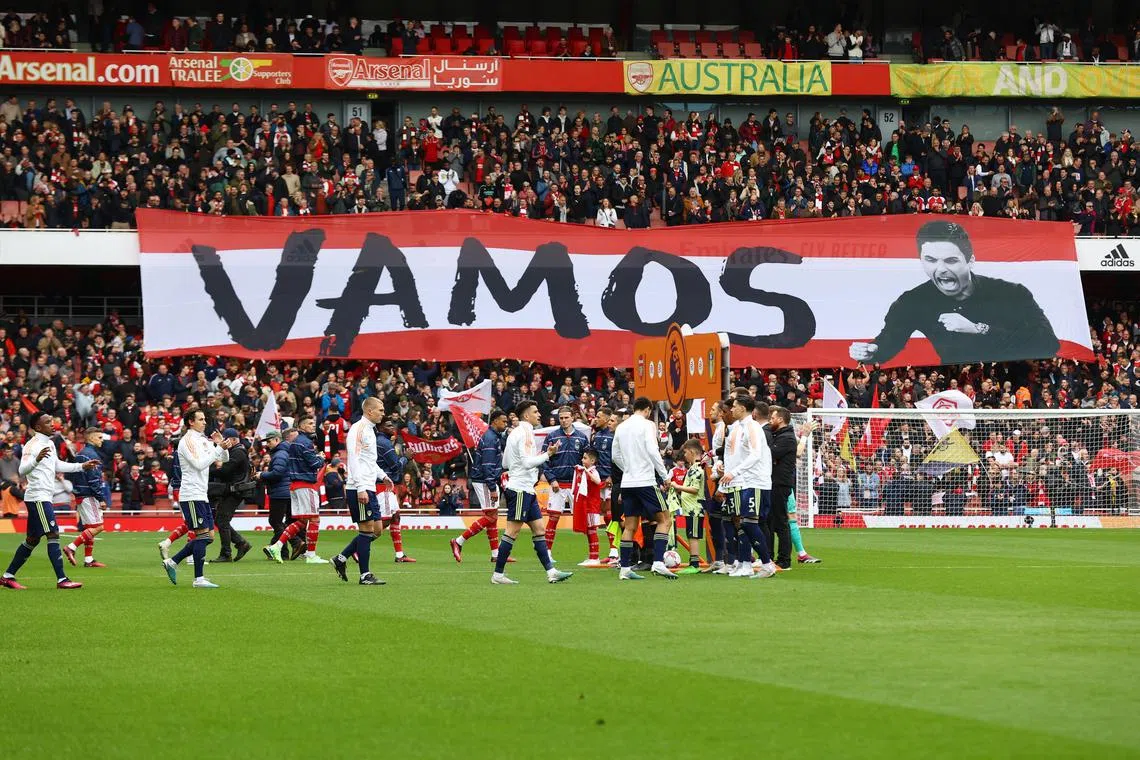 A banner of Mikel Arteta in the Emirates Stadium stands during a match against Leeds United. The Arsenal manager has called upon the home crowd to provide a boost to his players against Southampton on Friday.