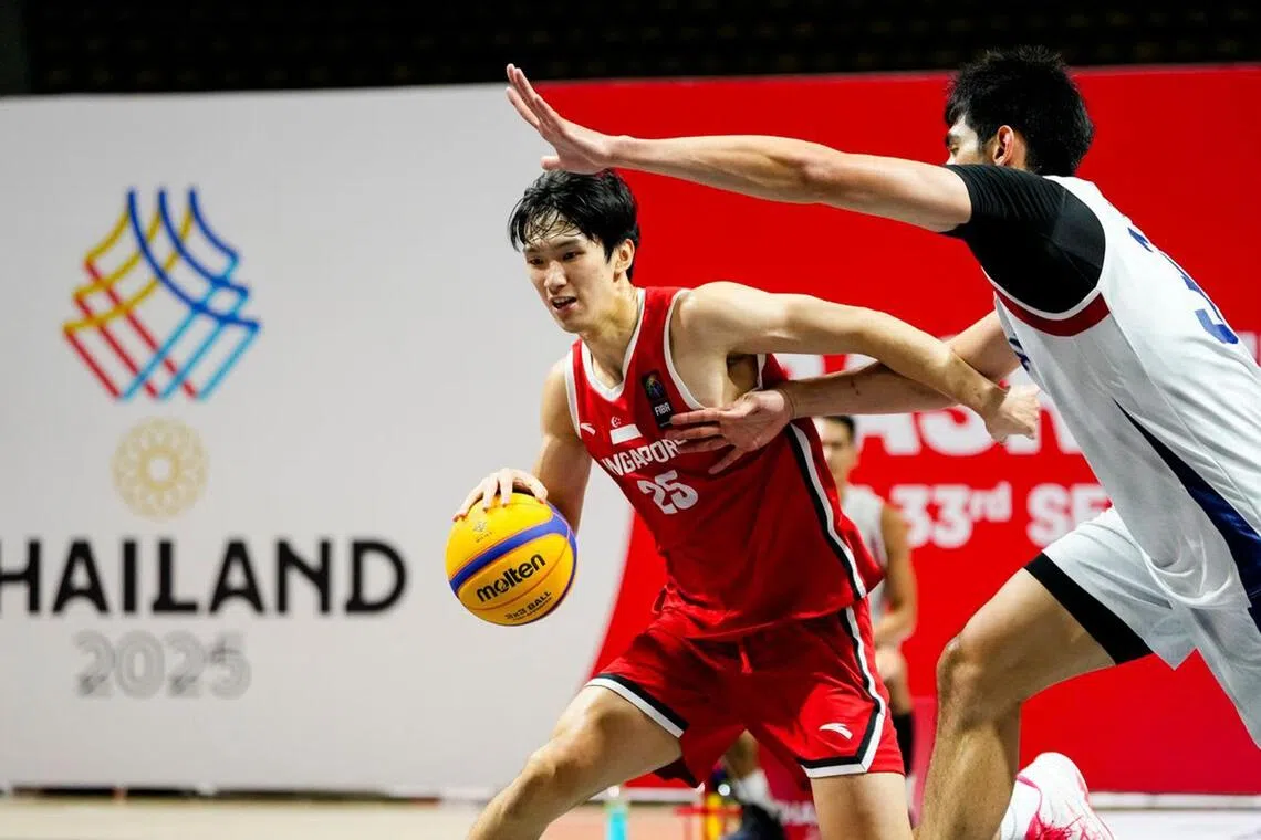 Singapore's Xu Duanyang in action against Thailand in the SEA Games men's 3x3 basketball final on Dec 11. Thailand won 21-18.