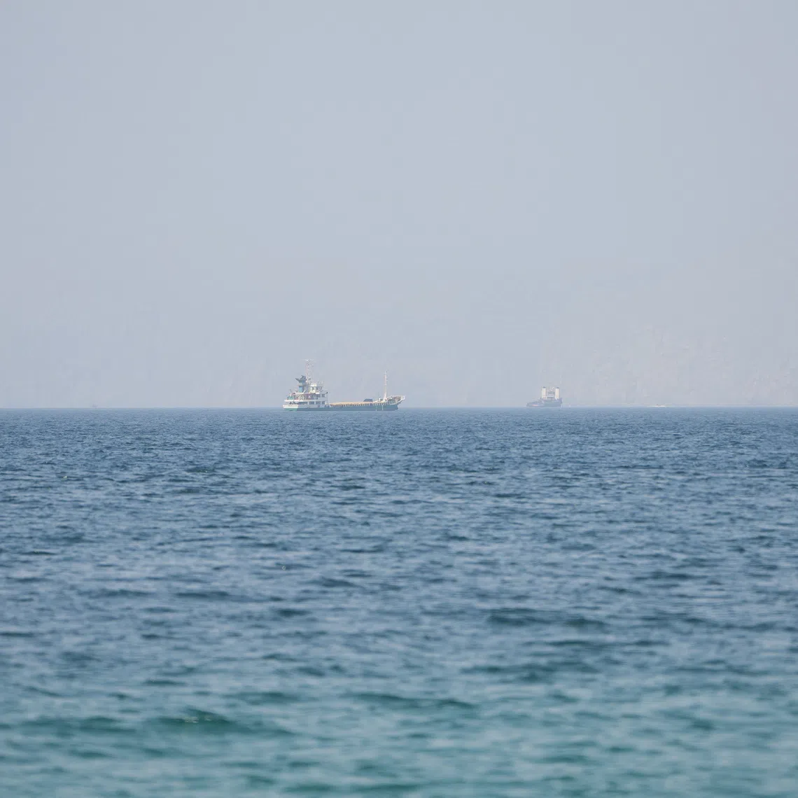Vessels near the Strait of Hormuz, as seen from Musandam, Oman, on Aug 6.
