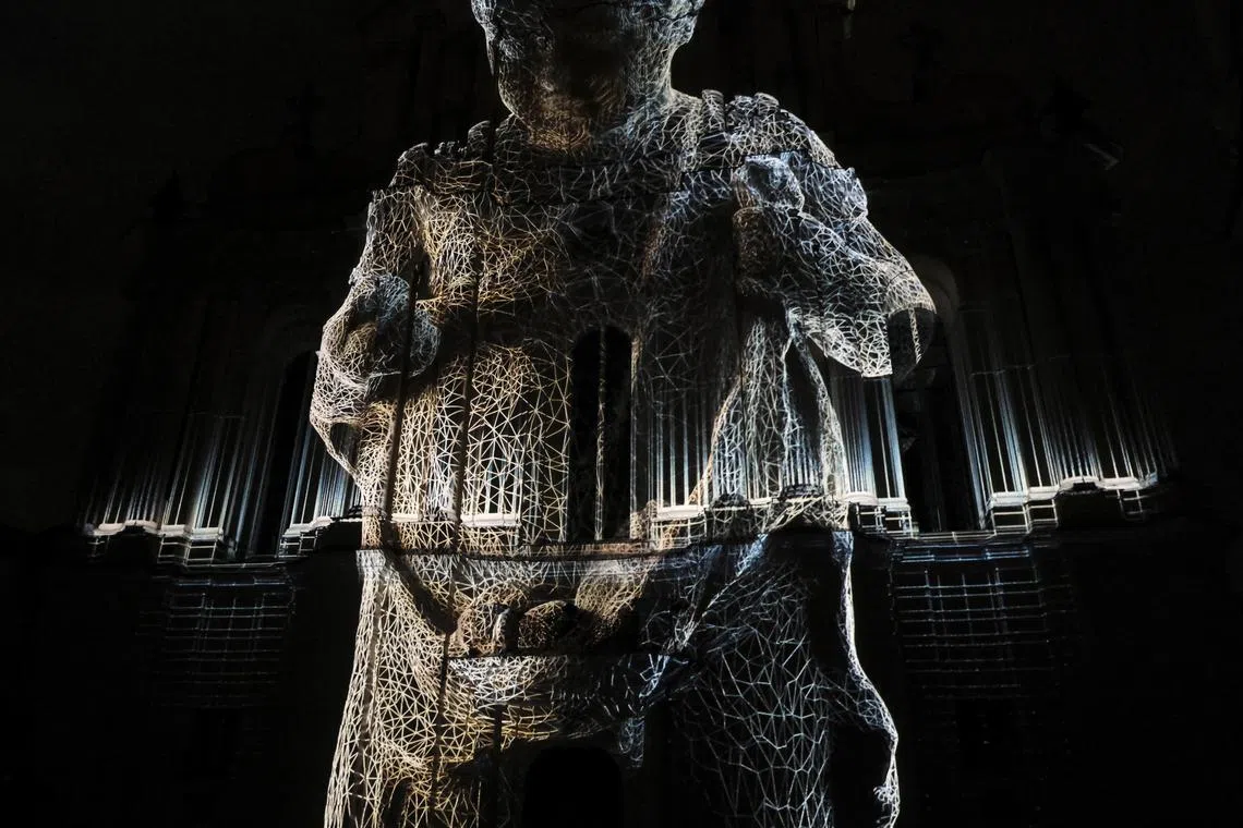 The light installation 'Dialogues' by Video Architects is perform at the Vilnius University main courtyard during the Vilnius 700th anniversary celebration, in Vilnius, Lithuania, Jan 25, 2023.  