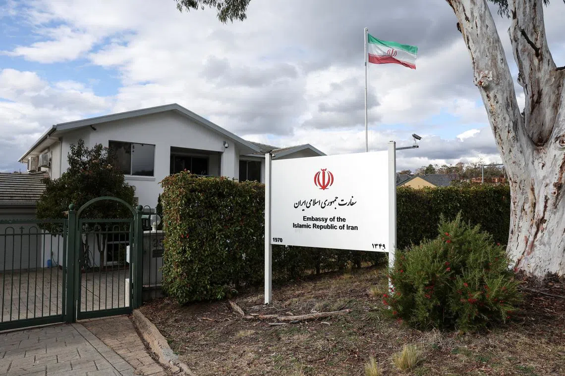 FILE PHOTO: An Iranian flag flutters outside the Embassy of the Islamic Republic of Iran, after the Iranian ambassador to Australia Ahmad Sadeghi was expelled on Tuesday and given seven days to leave the country by Prime Minister Anthony Albanese, who accused Iran of orchestrating at least two antisemitic attacks on Australian soil, in Canberra, Australia, August 27, 2025. REUTERS/Hollie Adams/File Photo