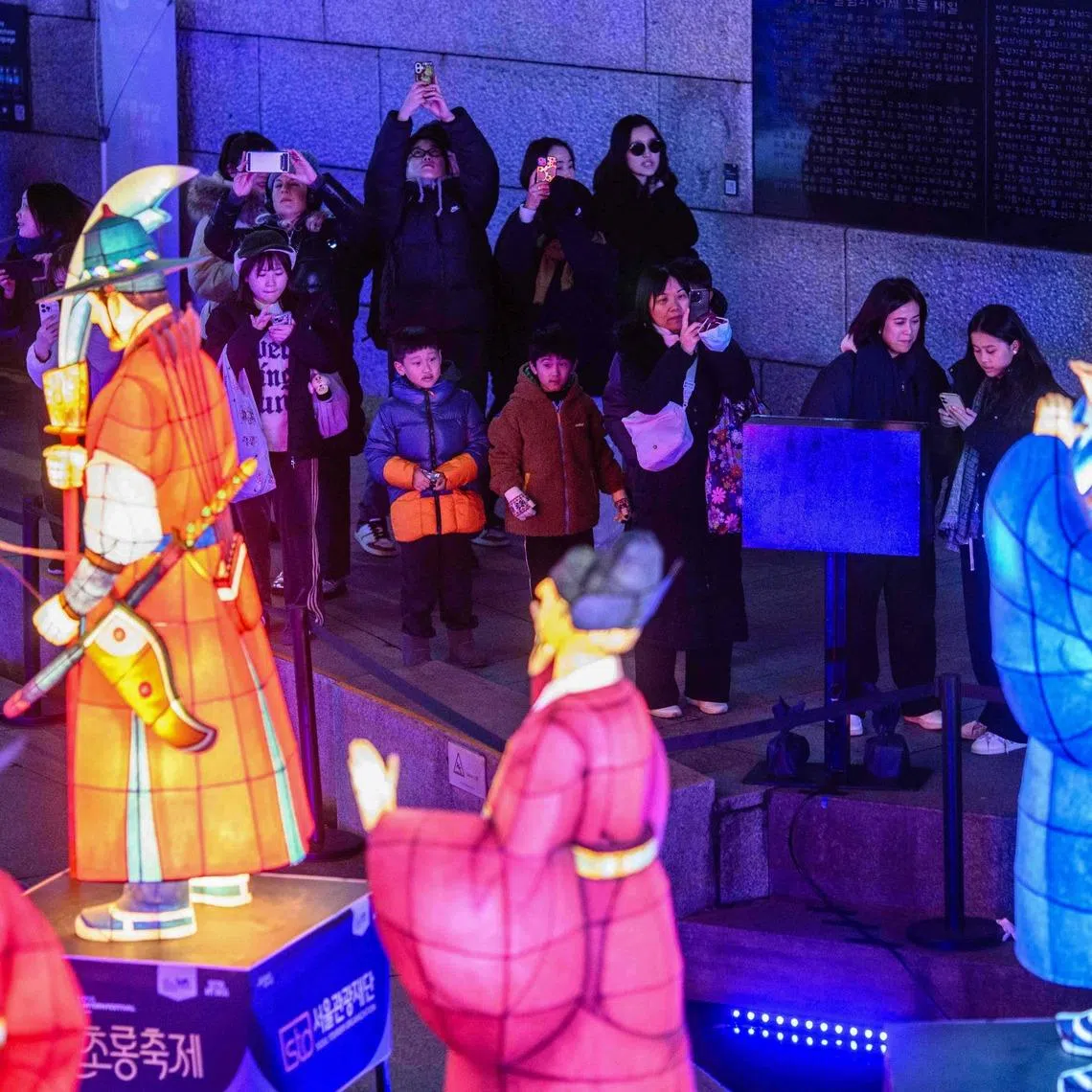 Visitors at the opening night of the Winter Festa in Seoul on Dec 12. Some 230,000 to 250,000 mainland Chinese visitors are expected to arrive in South Korea for the Lunar holiday starting on Feb 15.